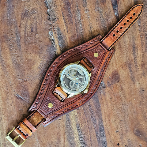 Bracelet montre steampunk en cuir véritable.